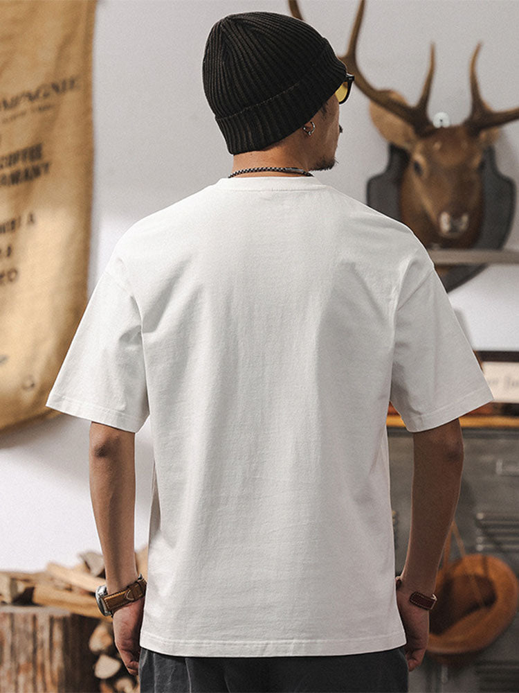 T-shirt à manches courtes pour homme avec poches contrastées et coupe ample