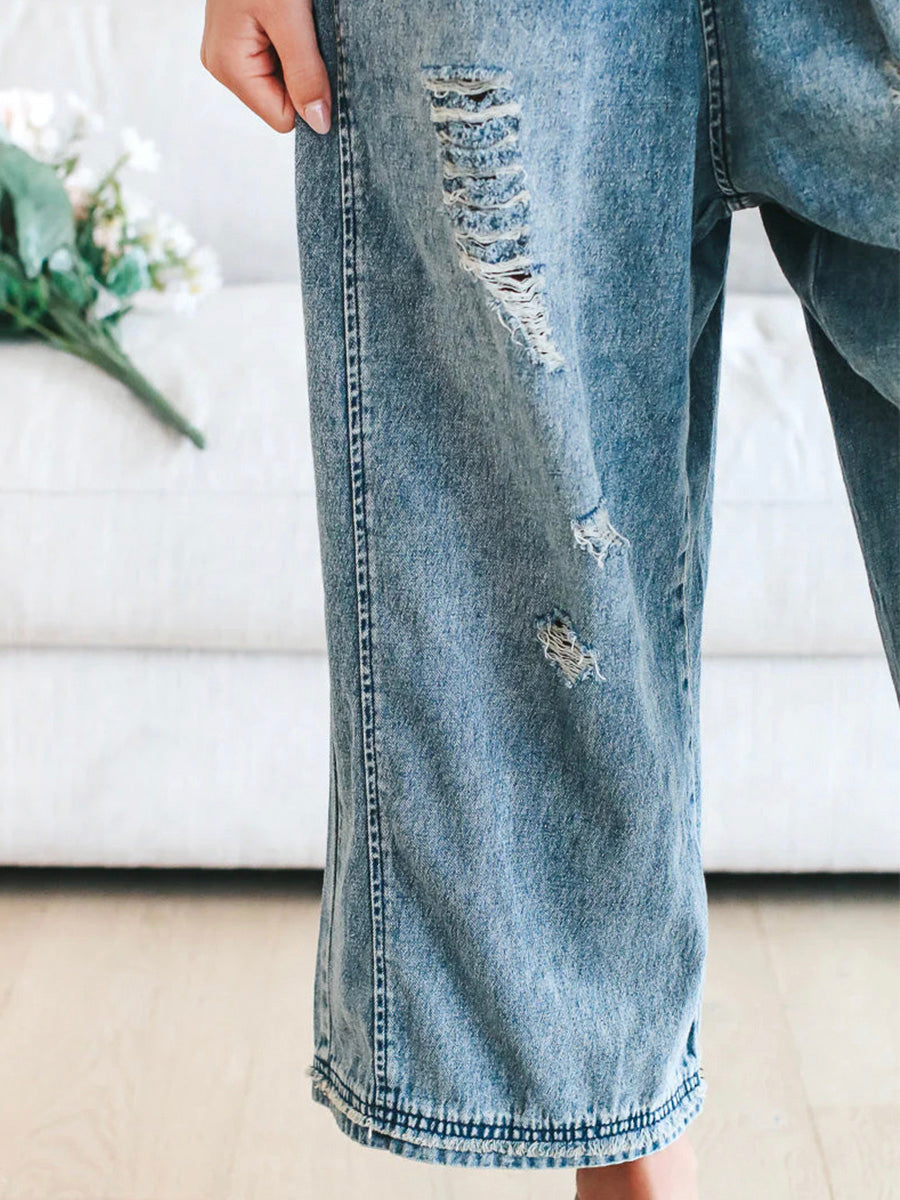 Locker sitzende Jeans-Latzhose im Used-Look