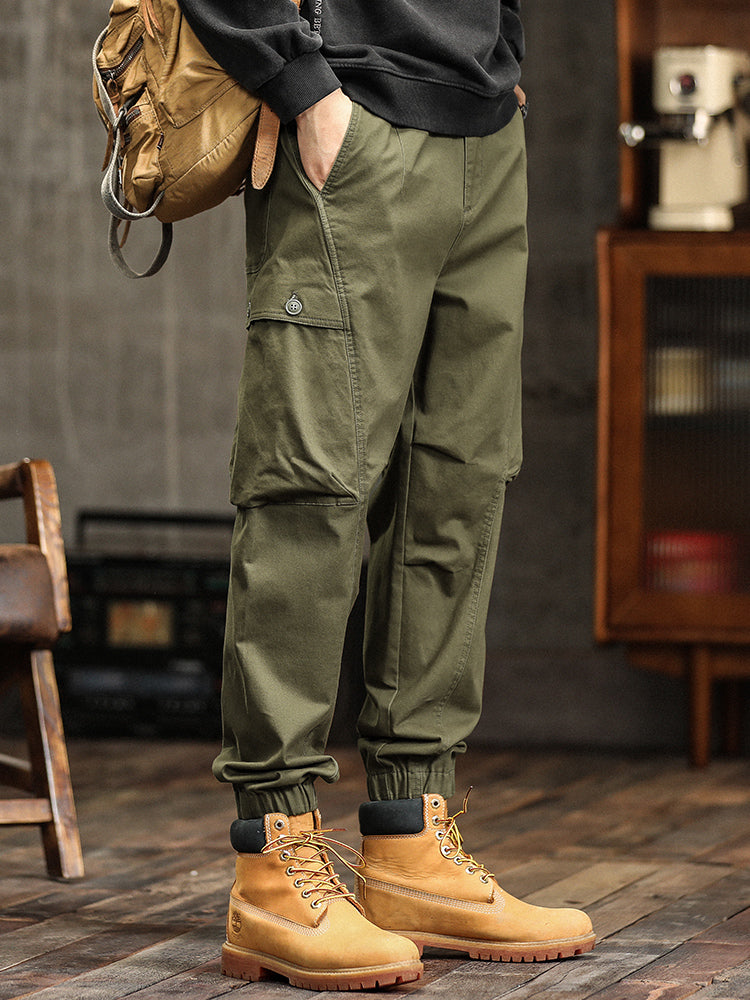 Pantalon cargo fuselé à taille élastiquée et boutons décoratifs pour homme
