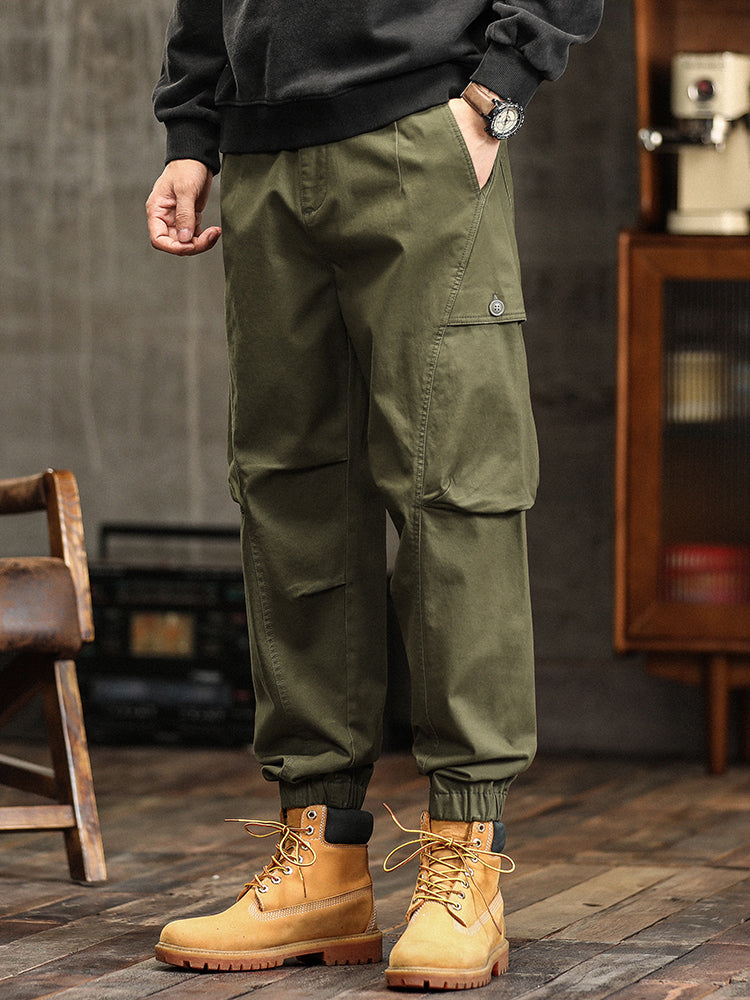 Pantalon cargo fuselé à taille élastiquée et boutons décoratifs pour homme