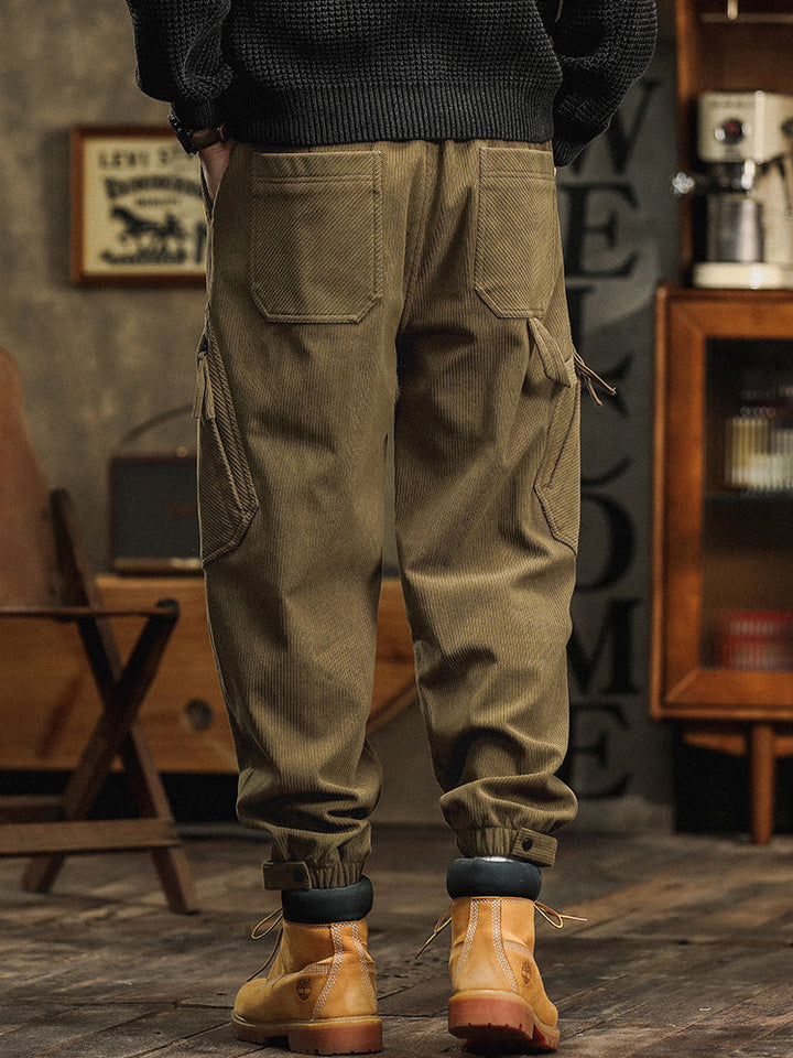 Pantalon cargo décontracté en velours côtelé avec sangles décoratives pour homme