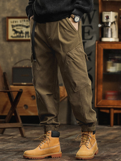 Pantalon cargo décontracté en velours côtelé avec sangles décoratives pour homme