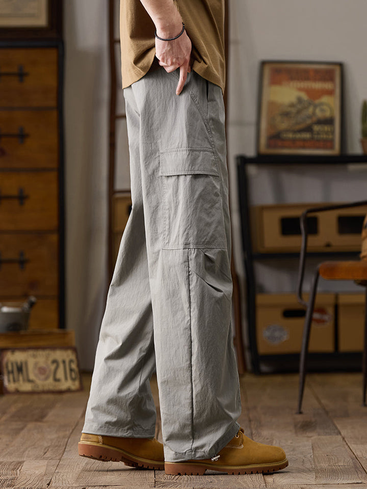 Pantalon cargo homme à jambes larges et poches multiples zippées