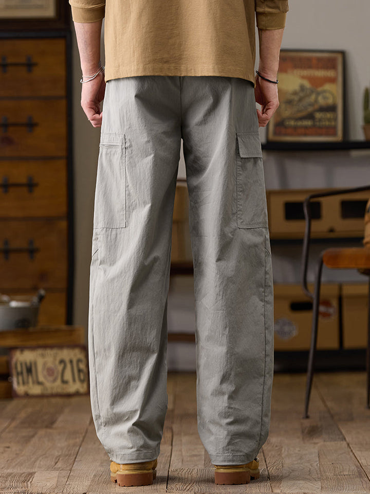 Pantalon cargo homme à jambes larges et poches multiples zippées