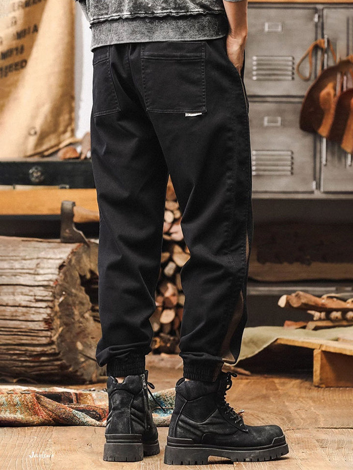 Pantalon de jogging pour homme avec bandes latérales et effet délavé vintage
